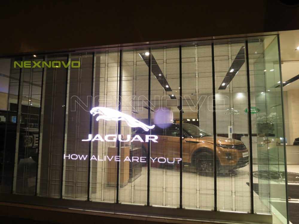 6359875265087162507860116.jpg 香港銅鑼灣路虎Landrove4S店透明LED顯示屏項目(圖4)